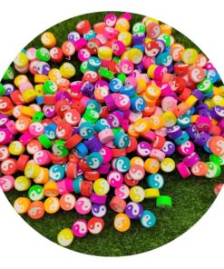 70010-9 - Tira de pucca/fimo ying yang colores