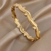 41066 - Pulsera Acero dorado corazon en sobre