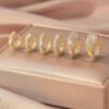 80410  -  Set 3 pares Zarcillos dorado con cristales