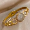 41042 - Pulsera acero dorada circulos con cristal