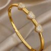 41059 - Pulsera Acero Dorado triple corazon con cristales