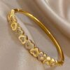 41089 - Pulsera acero dorada multi corazones