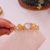 41107 - Pulsera acero dorado tri corazon