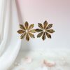 80288 - Zarcillo flor con perla acero dorado