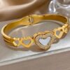 41056 - Pulsera Acero Dorado multi corazon