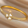 41068 - Pulsera Acero Dorado flor blanco