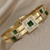 41010 - Pulsera acero dorada multi cristal