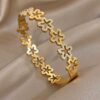 41157 - Pulsera acero dorada multi trebol con cristales