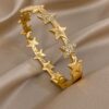 41162 - Pulsera acero dorada multi estrellas
