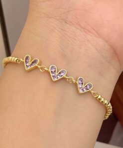 41173-2 Pulsera balines triple corazon morado