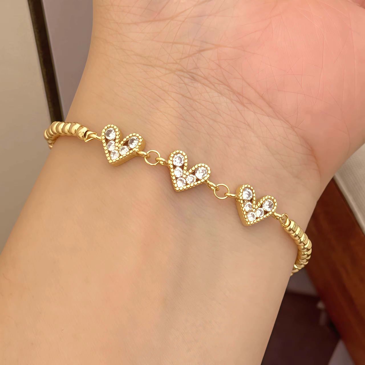 41173-4 Pulsera balines triple corazon blanco