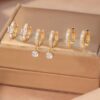 80433 - Set 3 PAR Zarcillos dorado con cristales