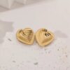 80140 - Zarcillos acero dorado corazon