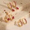 80432 - Set 3 Zarcillos dorado con cristales