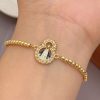 41086-1 Pulsera balines virgen con perlas