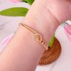 41044 - Pulsera acero dorada corazon amarrado