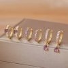 80441 - Set 3 Par Zarcillos dorado con cristales fucsia