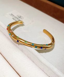 41013 - Brazalete dorado cristales multi color