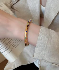 Alternative view of 41013 - Brazalete dorado cristales multi color