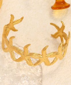 41053 - Pulsera Acero dorada multi estrella de mar