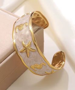 41071 - Pulsera Acero dorada estrella mar
