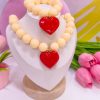 21139 - Collar chicle con corazon rojo