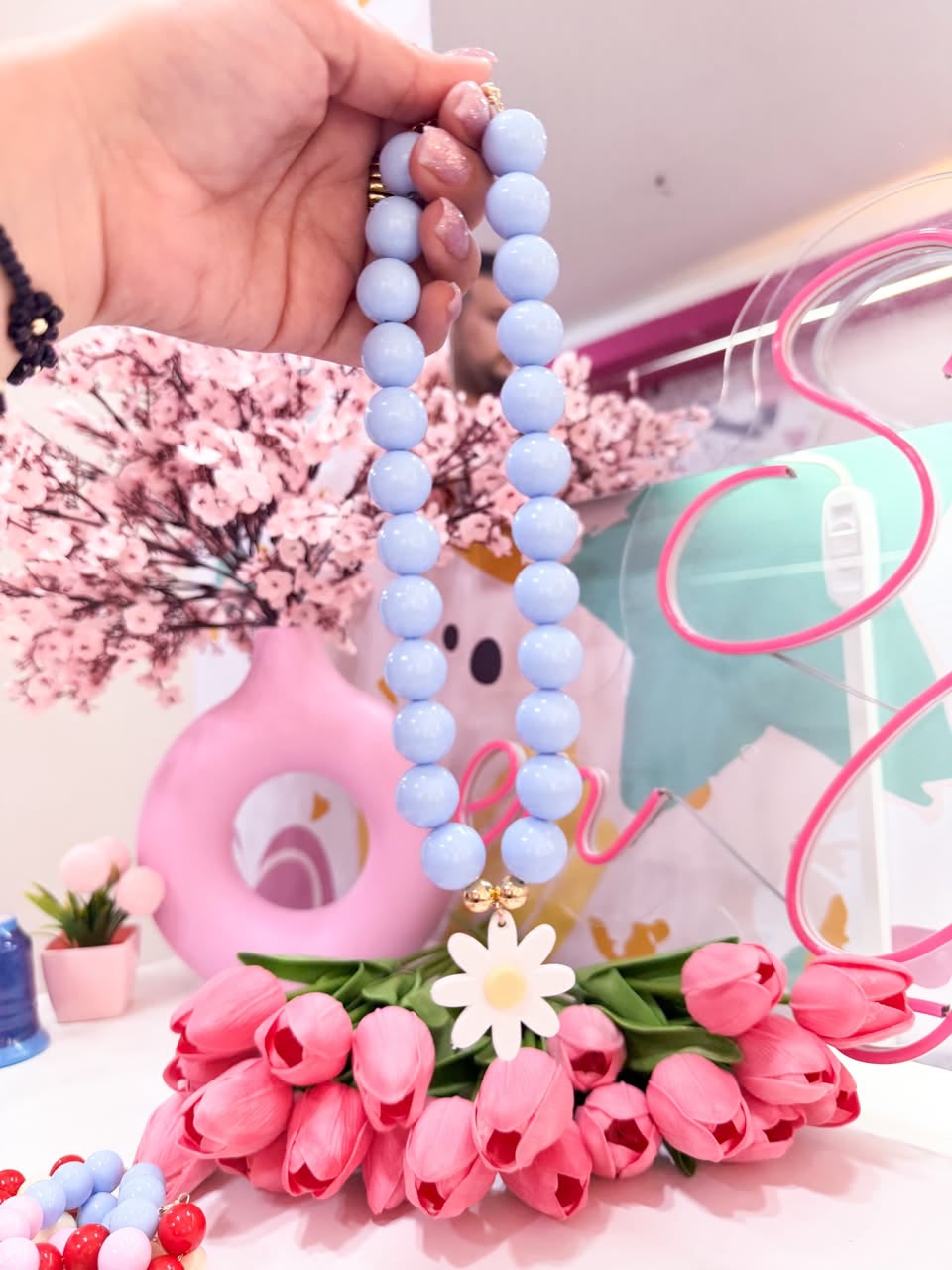 21128 - Collar chicle con flor y balines