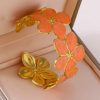 41075-1 Pulsera Acero dorada multi flor salmon