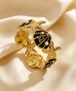 41097 - Pulsera Acero dorada caparazon esmaltado negro