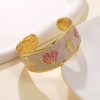 41102 - Pulsera Acero dorada caparazon rosa