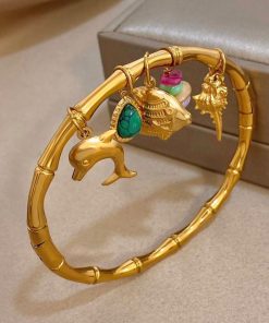 41106 - Pulsera Acero dorada multi dije
