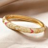 41129-1 Brazalete Acero esmaltado multi figuras beige