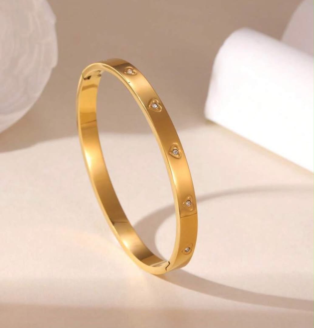 41153 - Pulsera acero dorada corazon con cristal interno