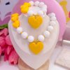 21168 - Set collar chicle blanco con amarillo corazon