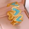 41073-3 Pulsera Acero dorada multi corazon azul claro