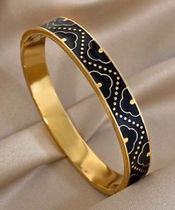41166-1 Pulsera acero dorada trebol fondo negro gruesa