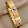 41193 - Pulsera acero dorada ojos con cristal
