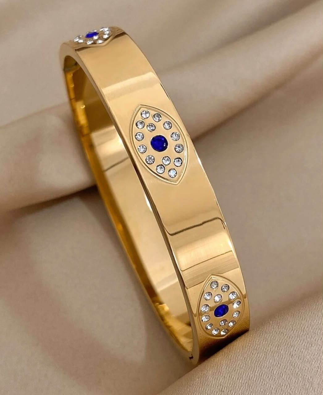 41193 - Pulsera acero dorada ojos con cristal