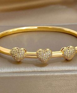 41200 - Pulsera acero dorado tri corazon con cristales