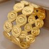 41204 - brazalete acero dorado multi monedas