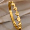 41207 - Pulsera acero dorado multi corazones con 1 cristal