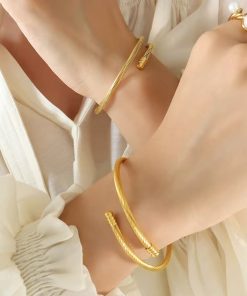 41209 - Pulsera acero dorado guaya
