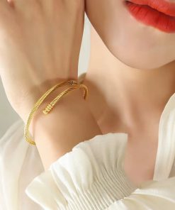 Alternative view of 41209 - Pulsera acero dorado guaya