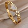 41211 - Pulsera acero dorado multi corazon