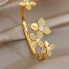 41224 - Pulsera acero dorado flores con perlas
