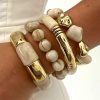 41225 - Set pulseras acrilicas blancas