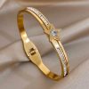 41237 - Pulsera acero dorado estrella con cristales