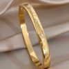41264 - pulsera acero dorado multi estrellas con cristales