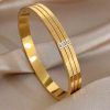 41265 - pulsera acero dorado trilinea con cristal
